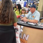 Signing Autographs at the NRA Convention 2013